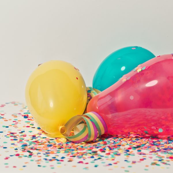 balloons and confetti on ground